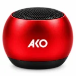 اسپیکر بلوتوثی قابل حمل AKO مدل AS-30 رنگ قرمز در کنار جعبه اصلی محصول با طراحی کوچک و جمع‌وجور
